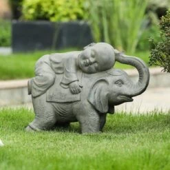 LuxenHome 14.5" Gray MgO Buddha Monk And Elephant Garden Statue