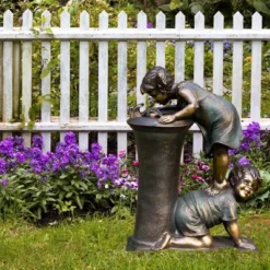 27" Resin Indoor/Outdoor Girl And Boy Drinking Water Fountain Yard Décor Bronze - Alpine Corporation